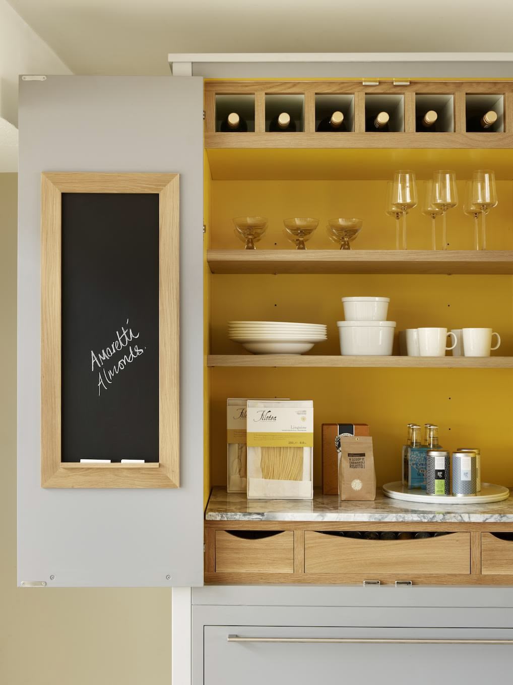 Harvey Jones white kitchen dresser open to show organised shelving