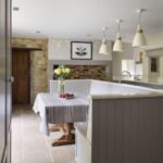 Kitchen dining nook featuring beige bench seating