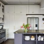 Blue kitchen island with open shelving