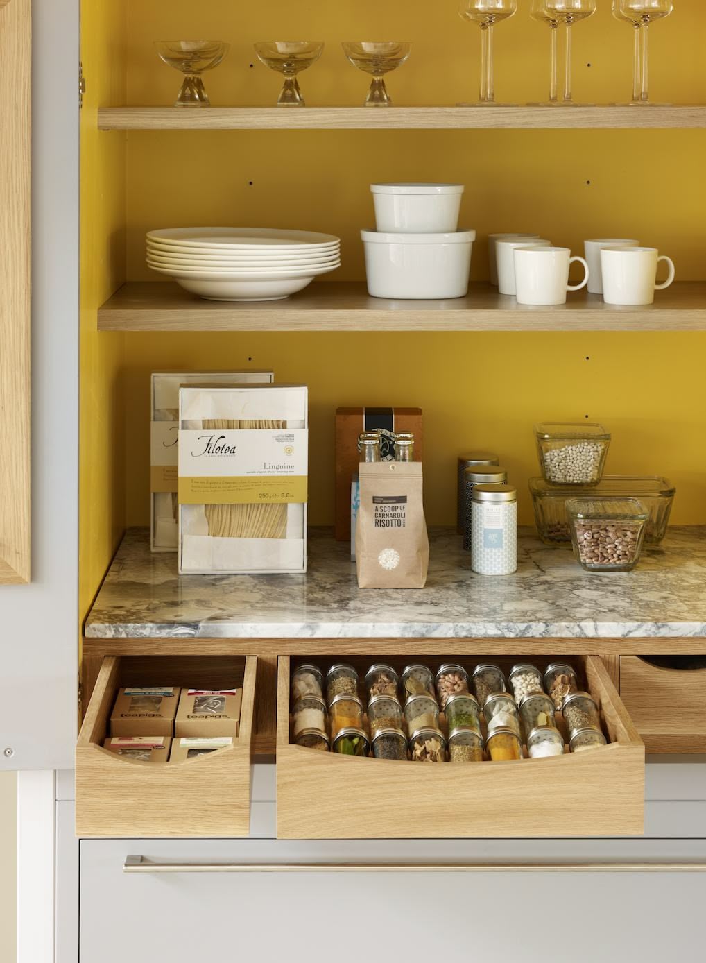 Harvey Jones white kitchen dresser open to show organised shelving
