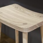 Closeup of natural wooden smile stool