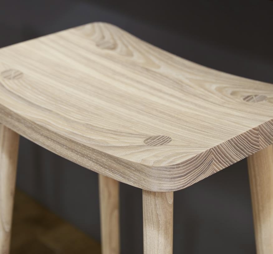 Closeup of natural wooden smile stool