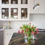 Closeup of brown and black marble kitchen island worktop