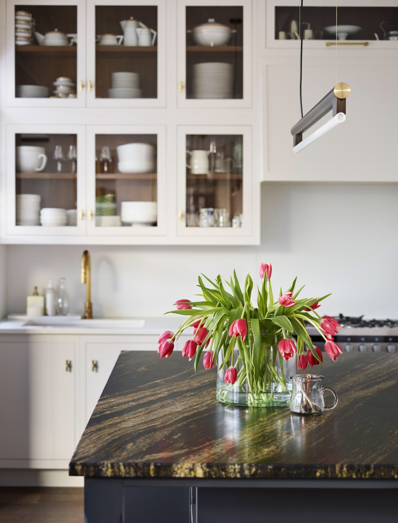 Closeup of brown and black marble kitchen island worktop