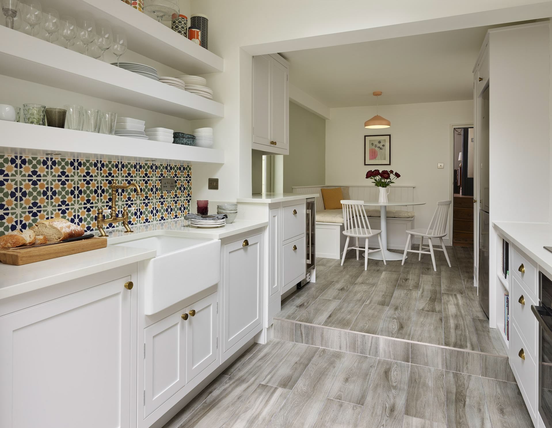 Arbor kitchen design featuring corner dining area with bench seating