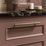 Closeup of pink Original design drawer with gold handle