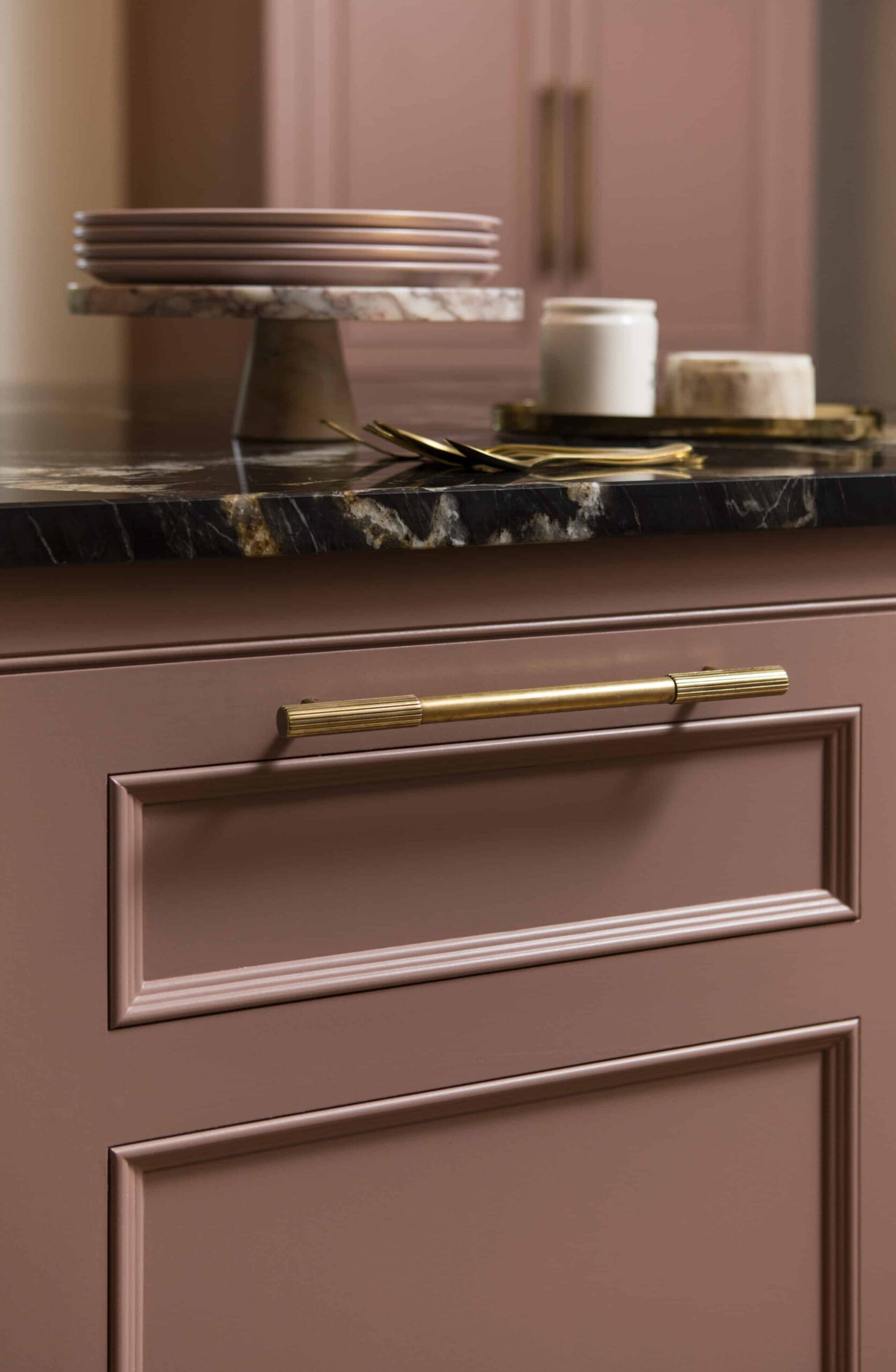 Closeup of pink Original design drawer with gold handle