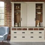 Harvey Jones cream kitchen dresser open to show organised shelving