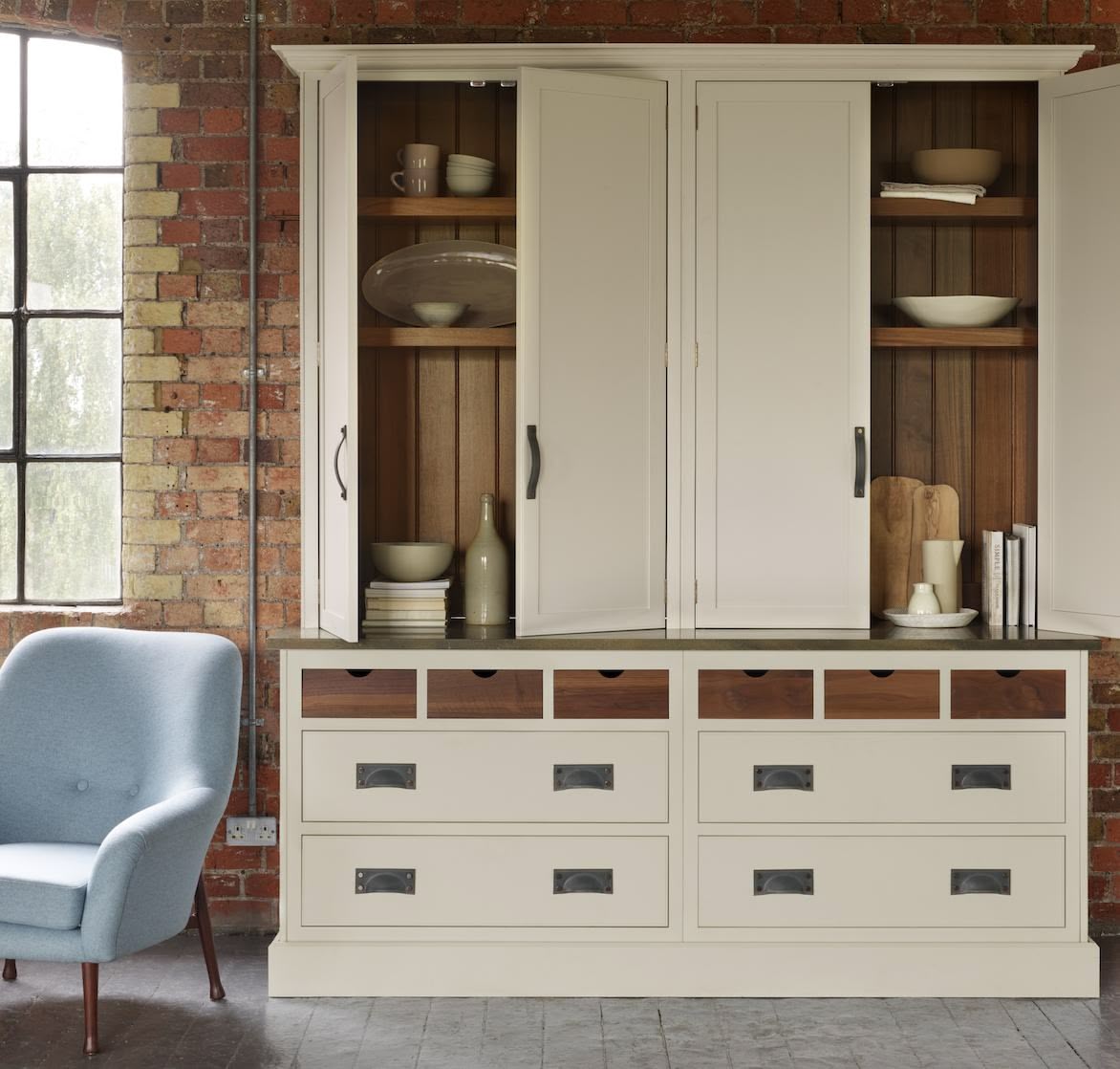 Harvey Jones cream kitchen dresser open to show organised shelving