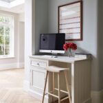 Off-white home office set-up featuring Original cabinetry
