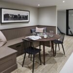 Dining area featuring brown bench seating