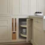 White integrated bin cupboard with light oak interior