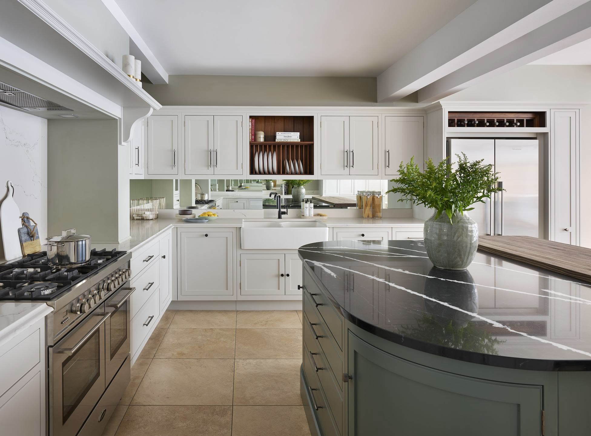 Arbor kitchen design with white kitchen cabinetry with white worktops and grey kitchen island with black marble worktop