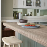 Natural wooden kitchen island extension with wooden stool