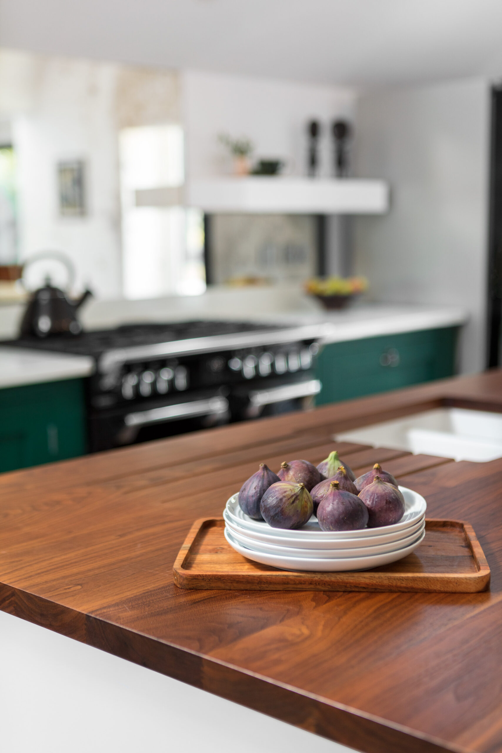 Walnut kitchen island with white Shaker end panel