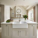 Beige Shaker kitchen island with integrated white basin sink