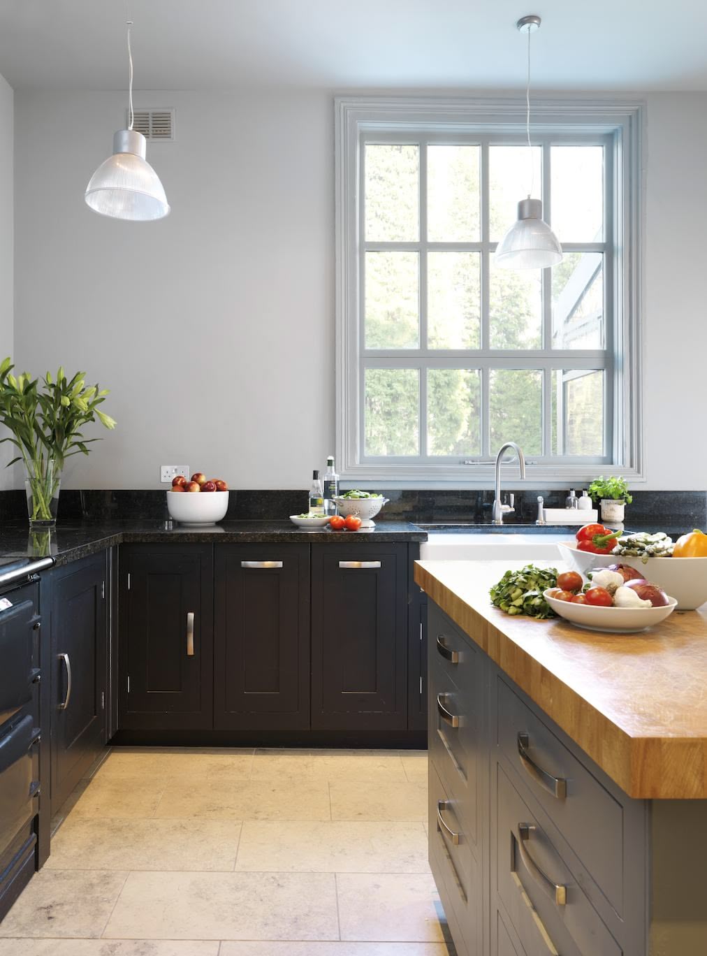 Dark grey Shaker kitchen cabinetry with Grey Shaker kitchen island with Angola Blue granite worktops