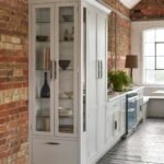 End cabinet featuring glass display window
