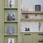 Harvey Jones end cabinet featuring shelving