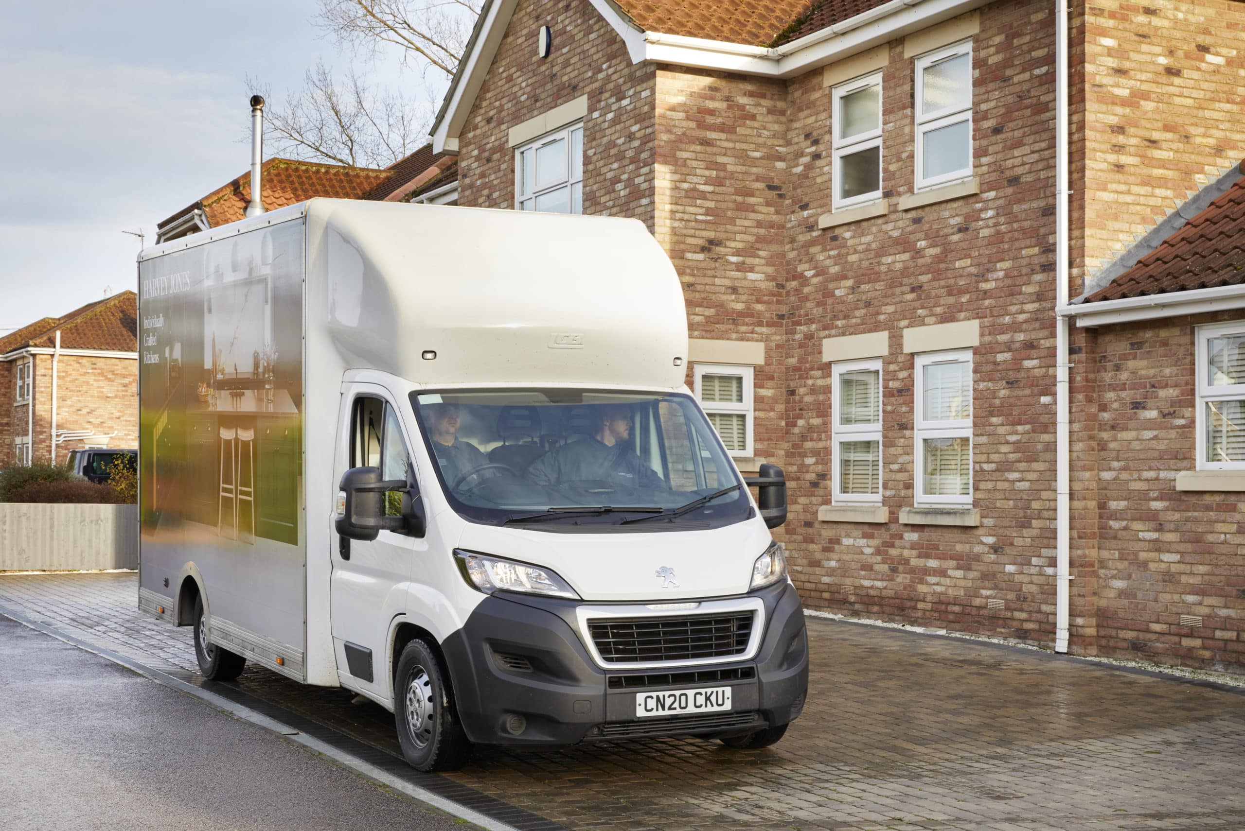 Van outside property showing delivery of a Harvey Jones kitchen