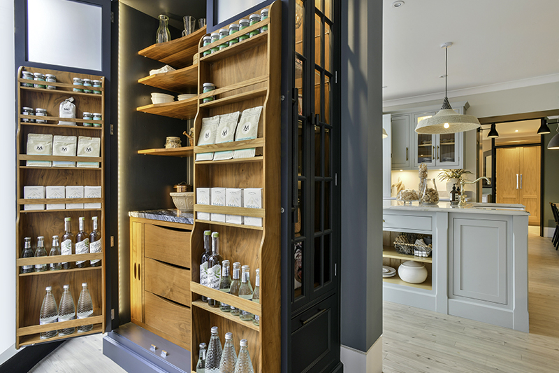 Harvey Jones end cabinet open to reveal organised storage