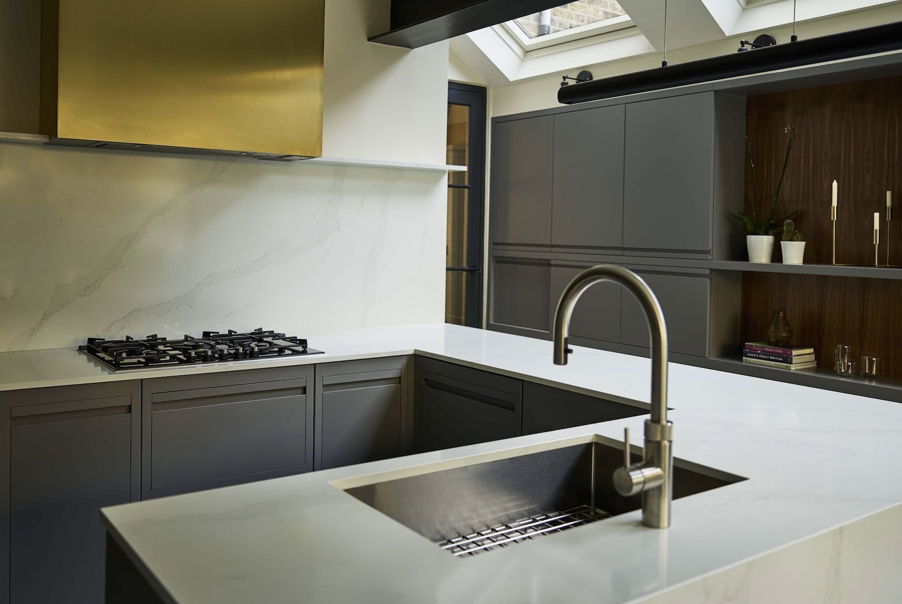 Dark grey Linear edge cabinetry with grey granite worktop