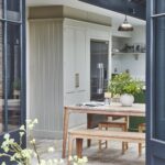 Beige Arbor kitchen design larder and American style refrigerator