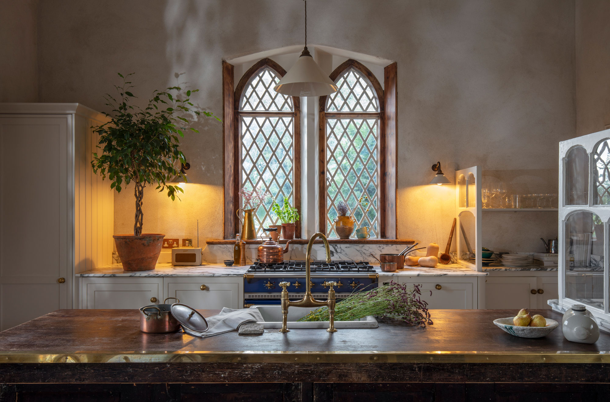 Rectory kitchen featuring Arbor cabinetry, dark wood kitchen island and basin sink