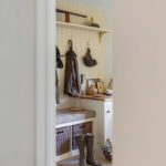 Cream and white boot room seen from Kitchen entrance