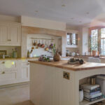 Country style Original Kitchen design with white kitchen island with walnut worktops
