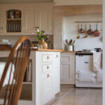 Country style Original kitchen cabinetry with walnut worktops