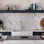 Dark Arbor cabinetry with white marble worktops featuring a white basin sink with a gold tap