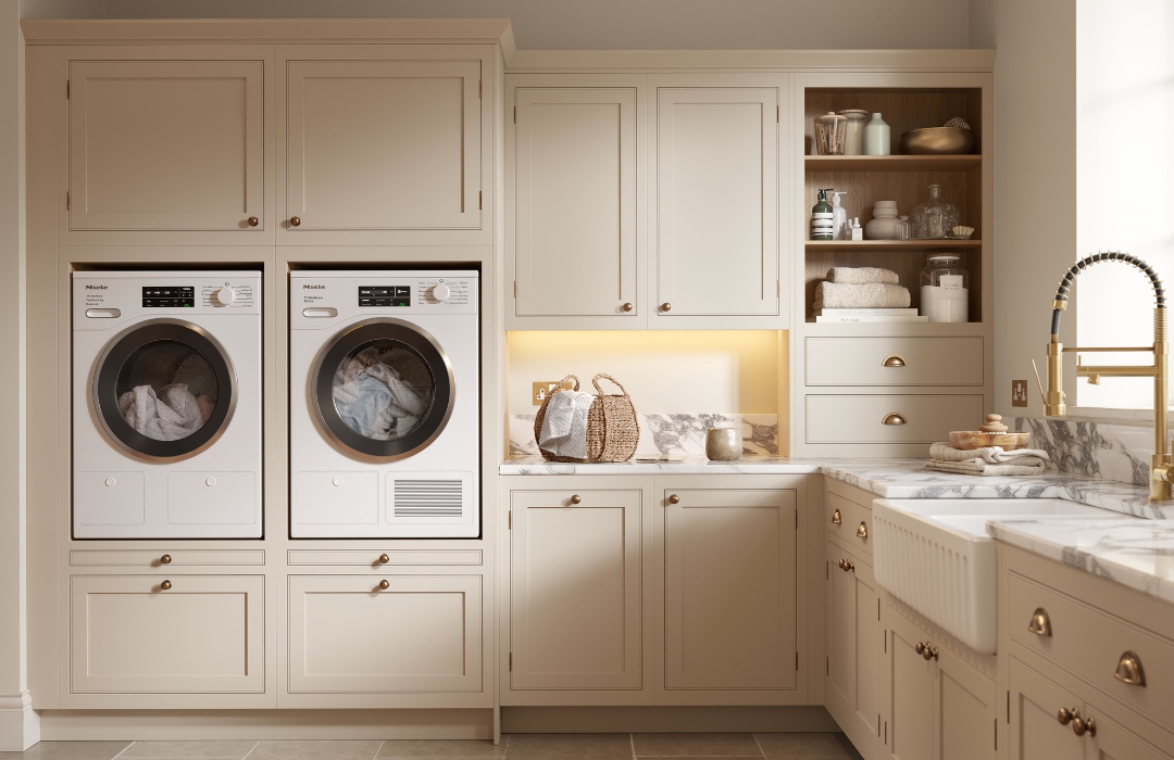 Utility room appliances within beige cabinetry