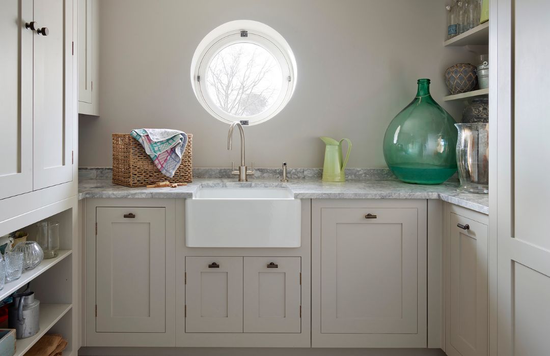 Utility room featuring white Harvey jones cabinetry