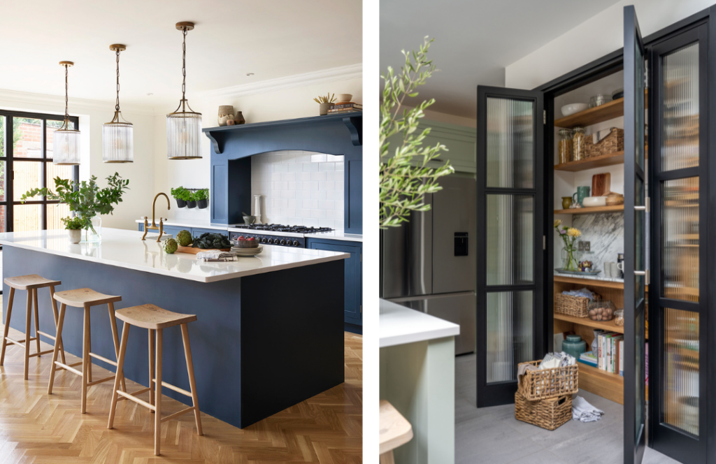 Blue kitchen island with white worktop featuring fluted glass pendant lighting and black kitchen pantry larder with black framed fluted glass doors