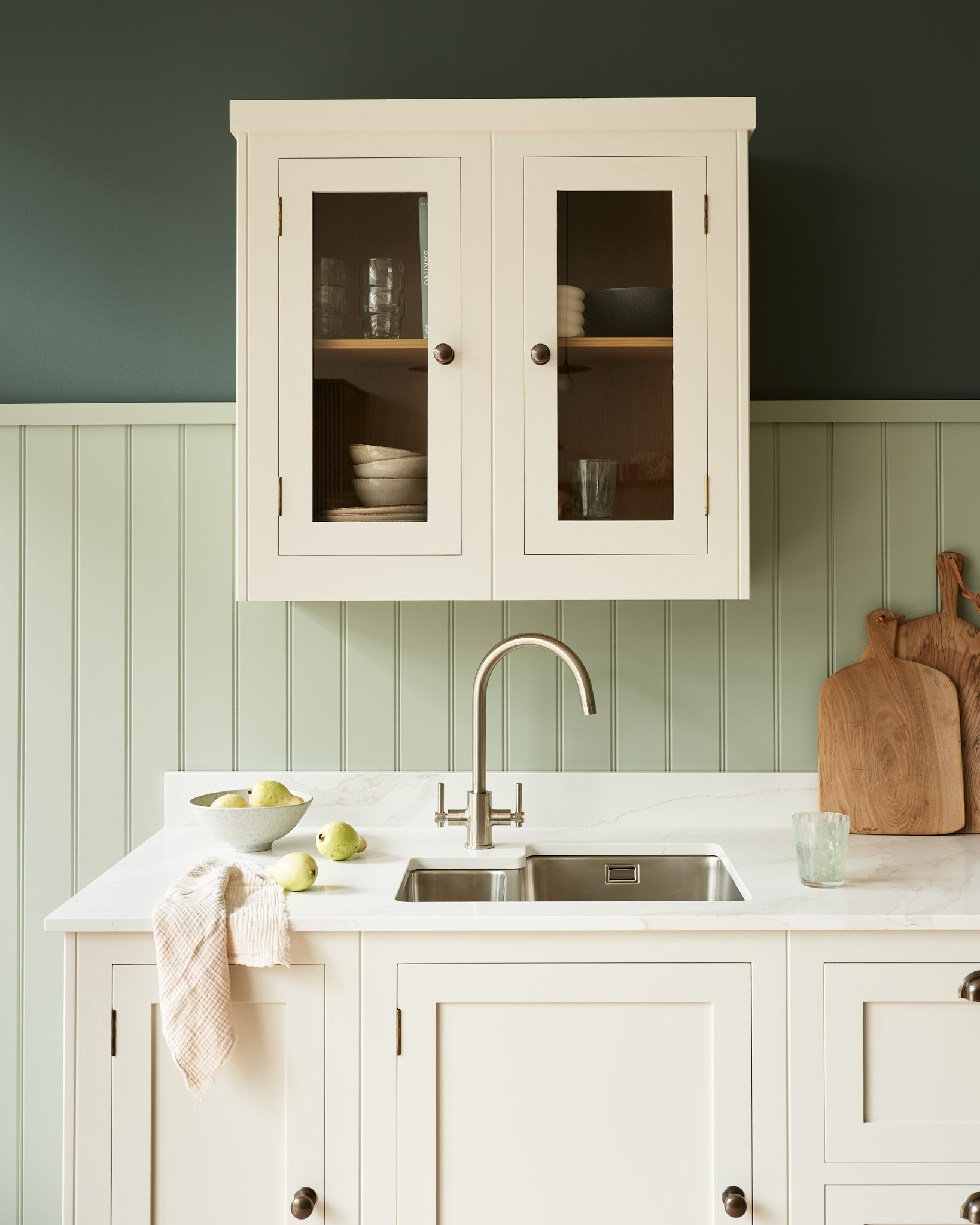 Hampton kitchen design featuring white cabinetry