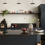 Open plan Harvey Jones X Swoon dark kitchen design