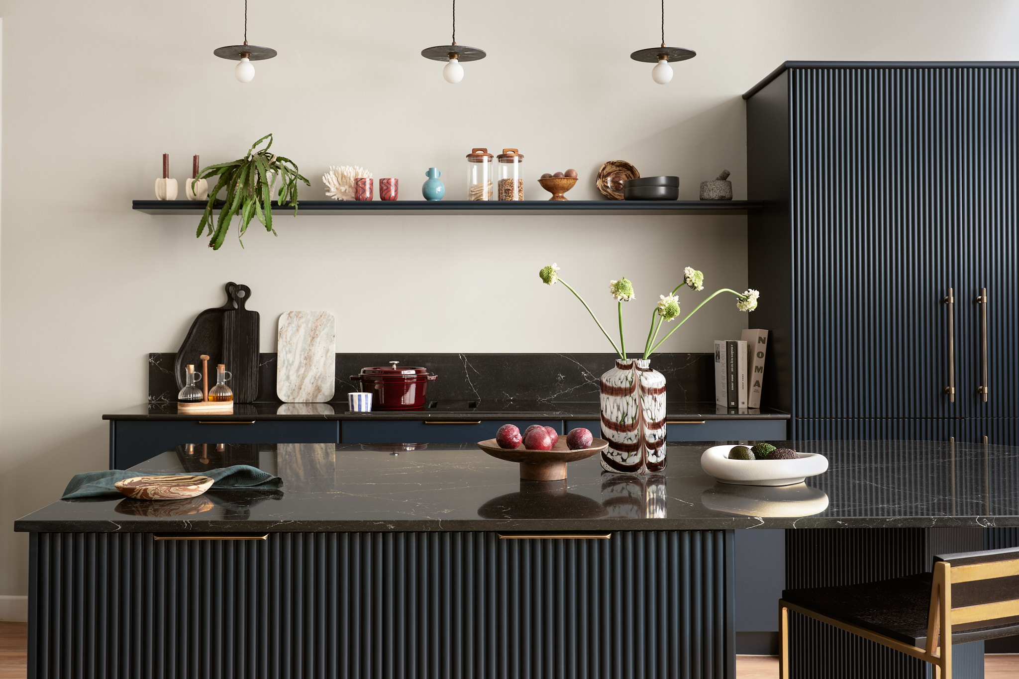 Open plan Harvey Jones X Swoon dark kitchen design