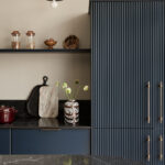 Dark Harvey Jones X Swoon cabinetry featuring reeded detailing
