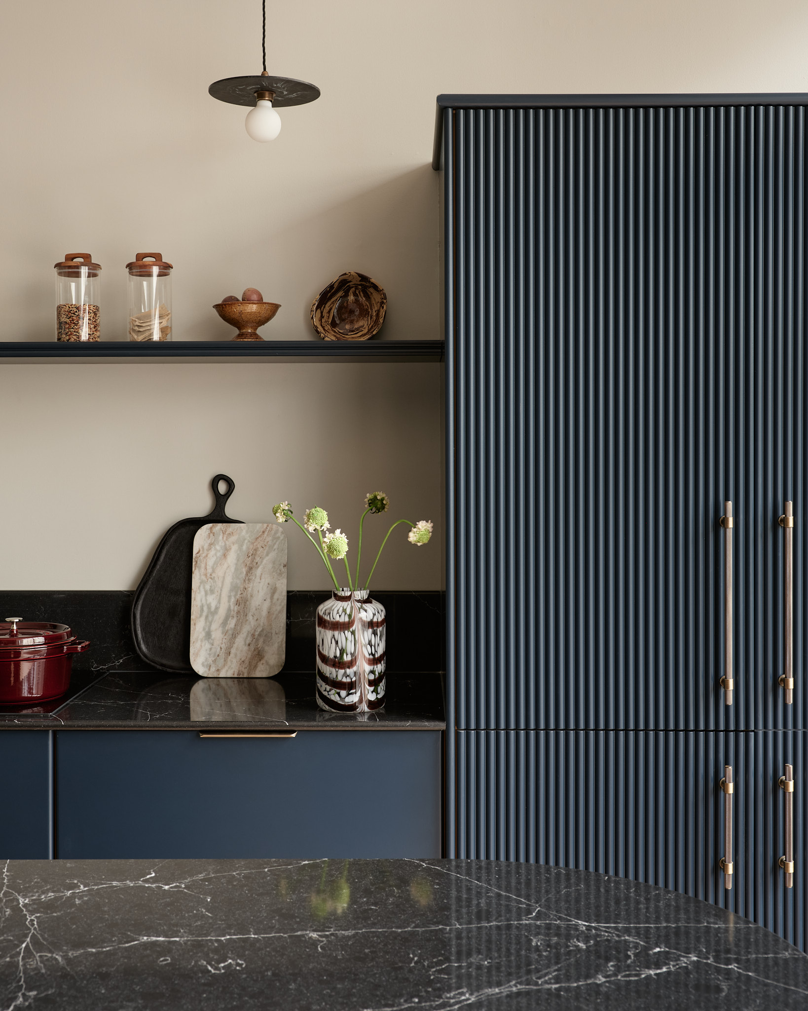 Dark Harvey Jones X Swoon cabinetry featuring reeded detailing