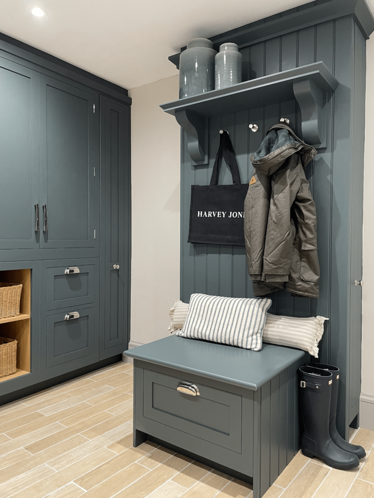 Dark blue boot room furniture with hooks, shelf and storage