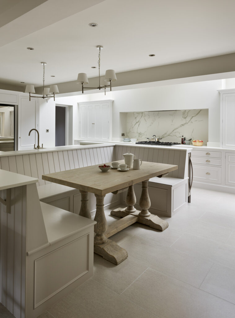 Beige kitchen design with dining nook