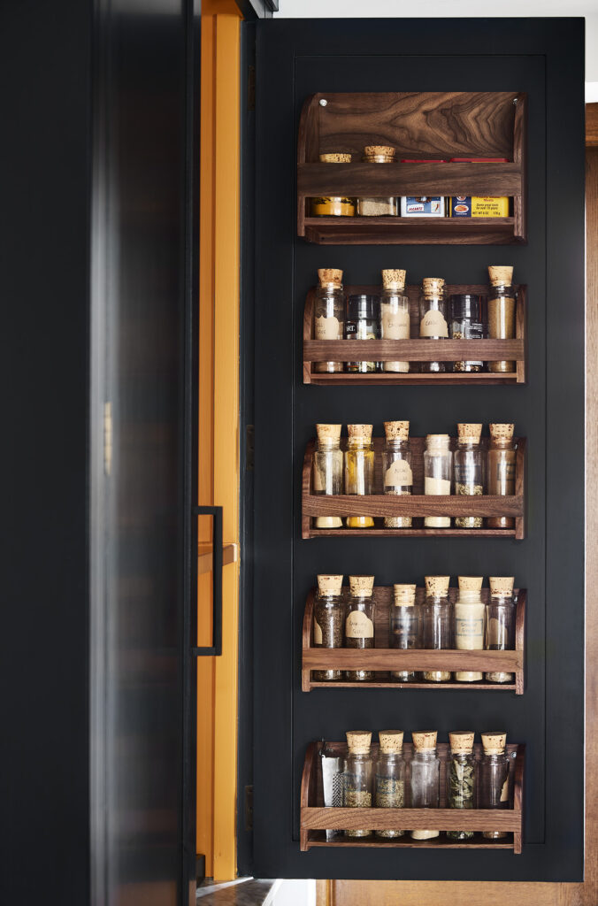 Bespoke kitchen cupboard organisation with cupboard door spice rack