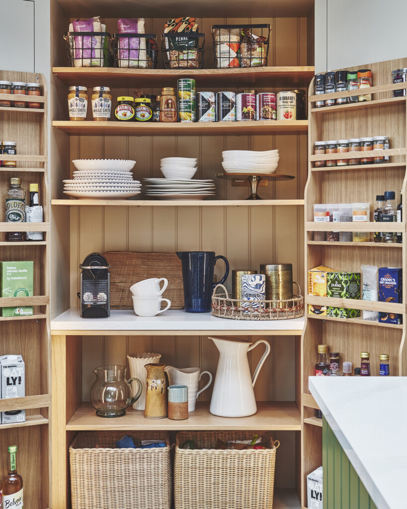 Bespoke oak pantry larder with door storage for spices and bespoke shelving