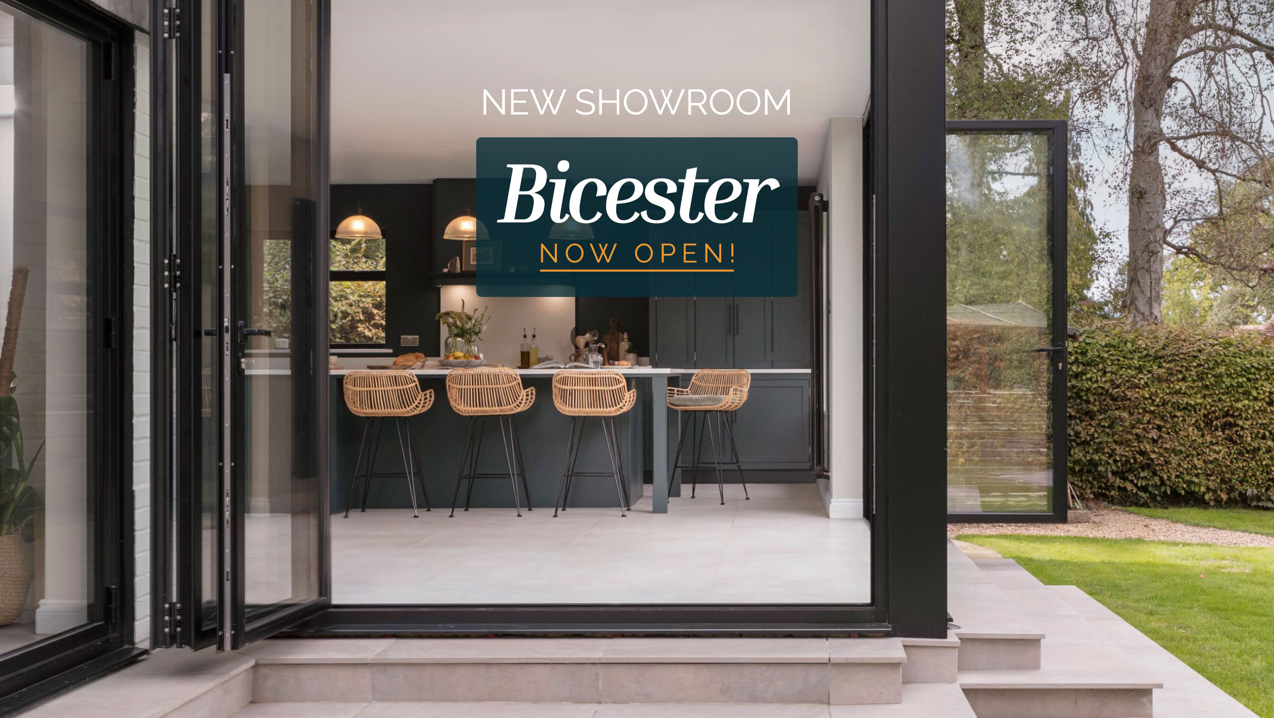 green kitchen island with new Harvey Jones bicester showroom message