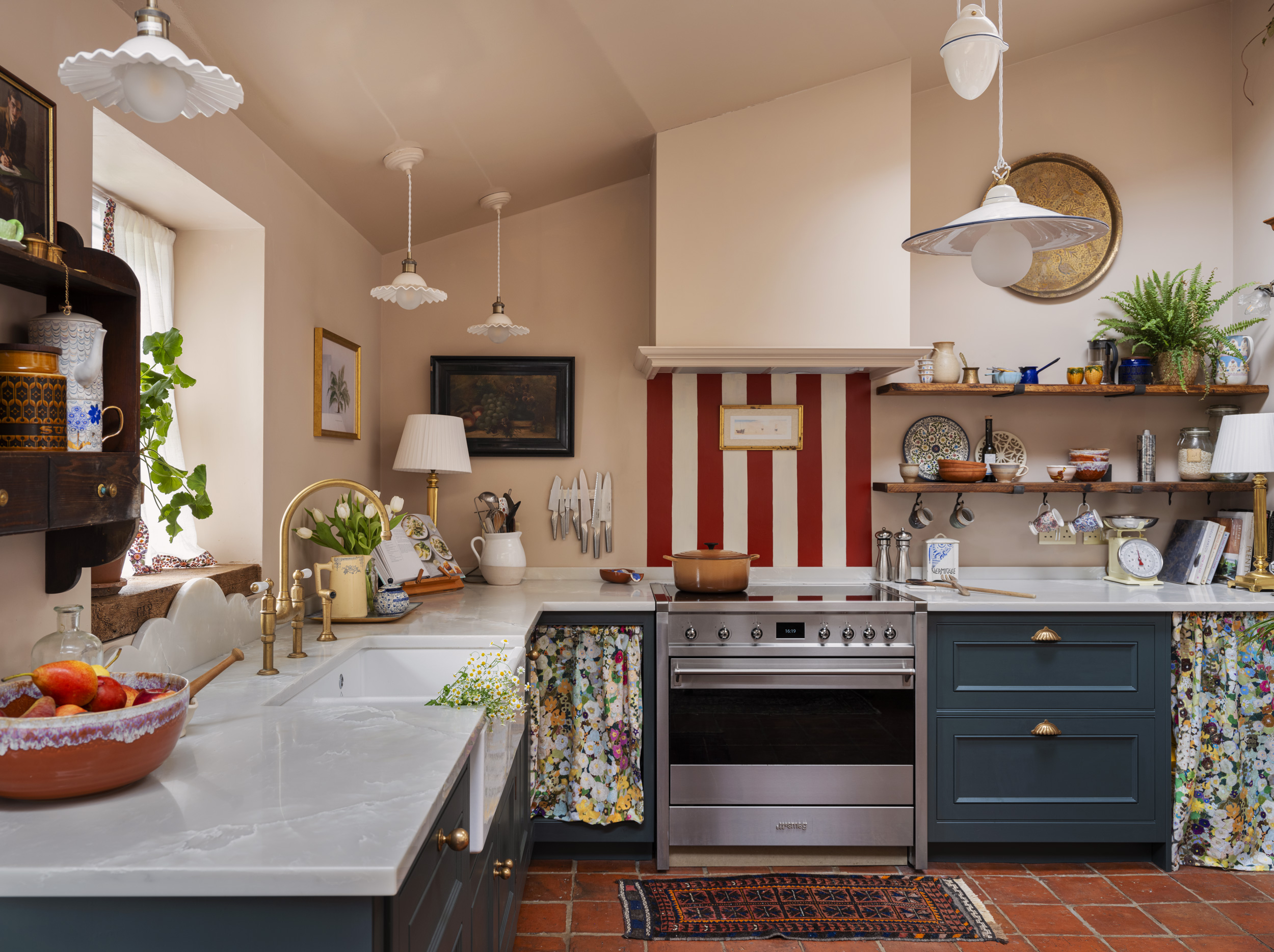 vintage style eclectic kitchen with burgundy striped wall