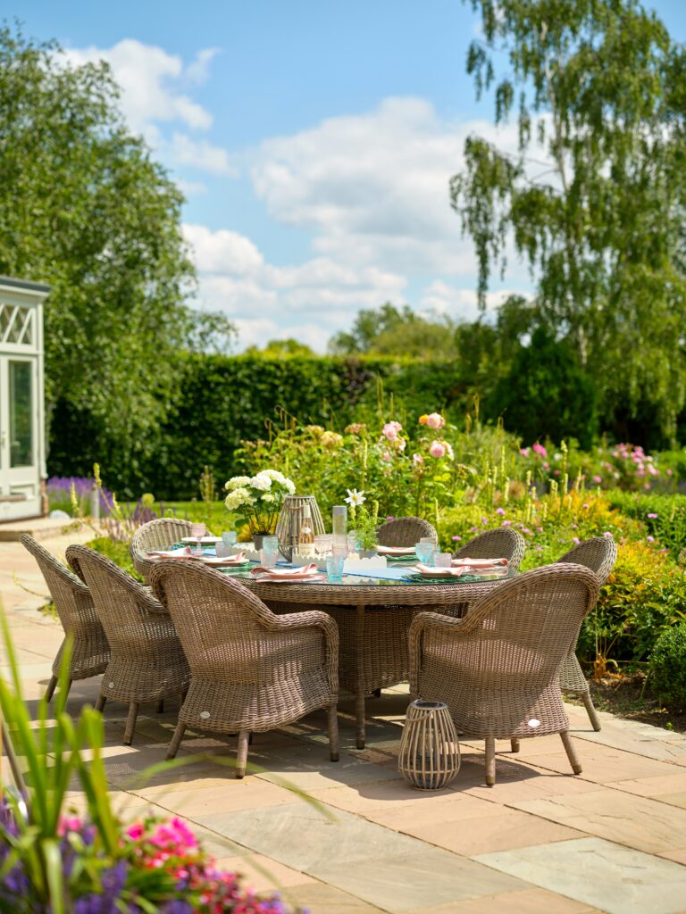 Sunny garden patio area with garden dining area.