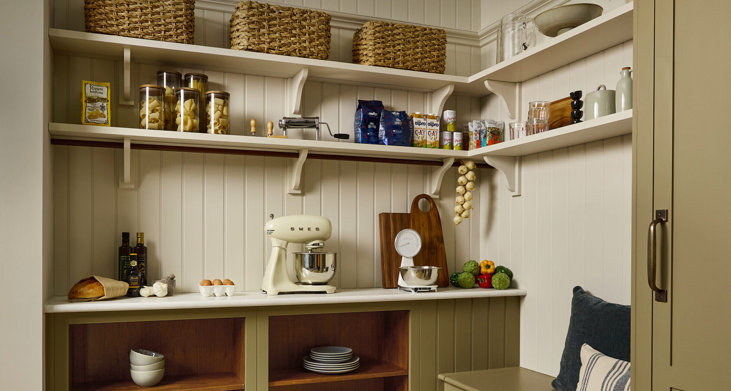 Walk-in Pantry with opening shelving and hanging rail