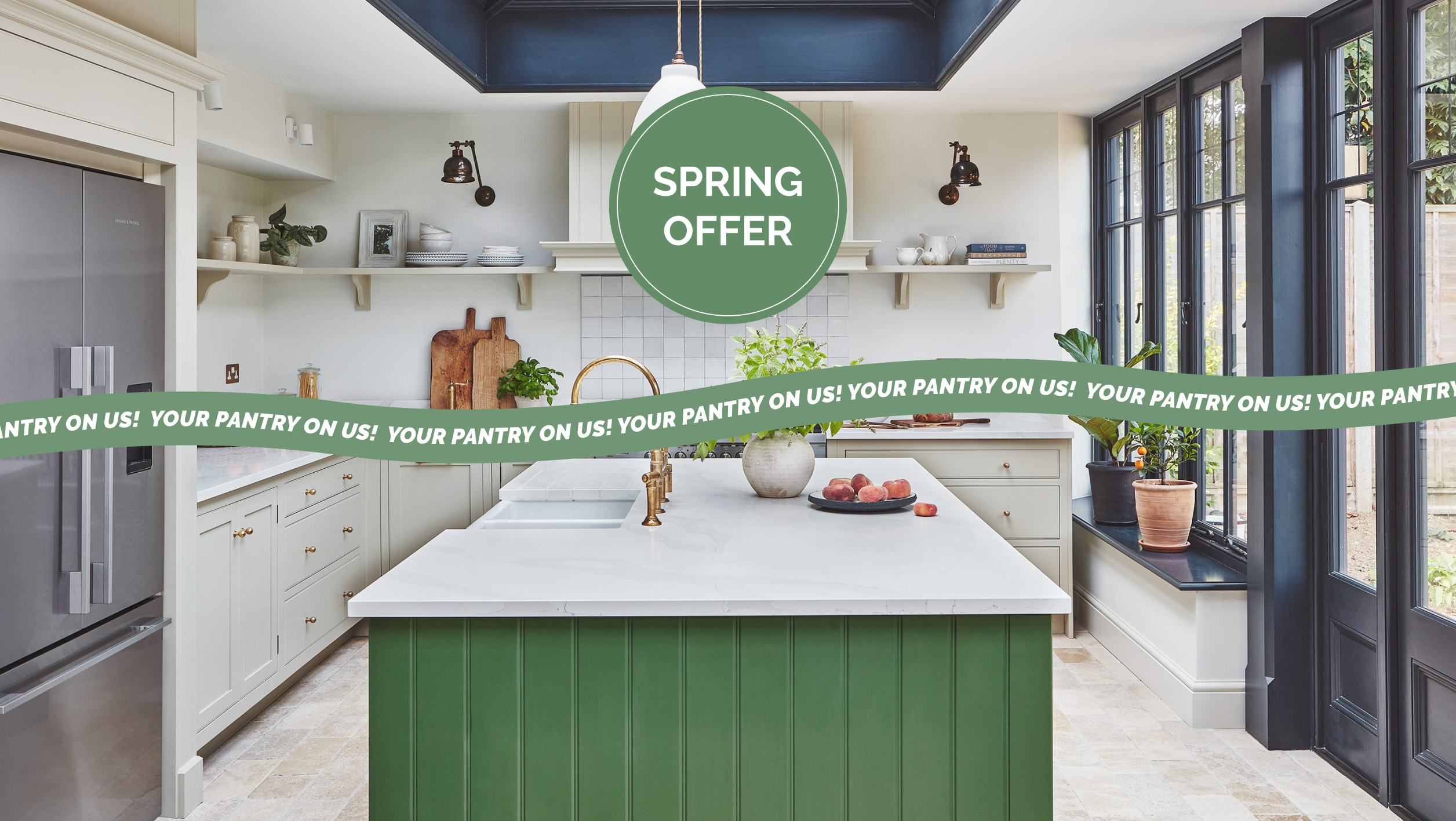 green kitchen with spring offer message and pantry sub heading