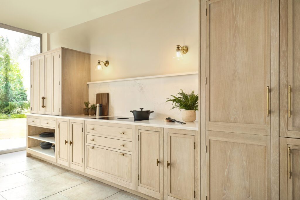 slim shaker kitchen in washed oak with floor to ceiling window